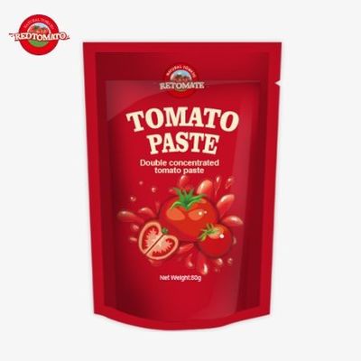 Bolsa de pie que contiene 80 g de pasta de tomate de doble concentración ofrecida con niveles de pureza que varían del 30% al 100%